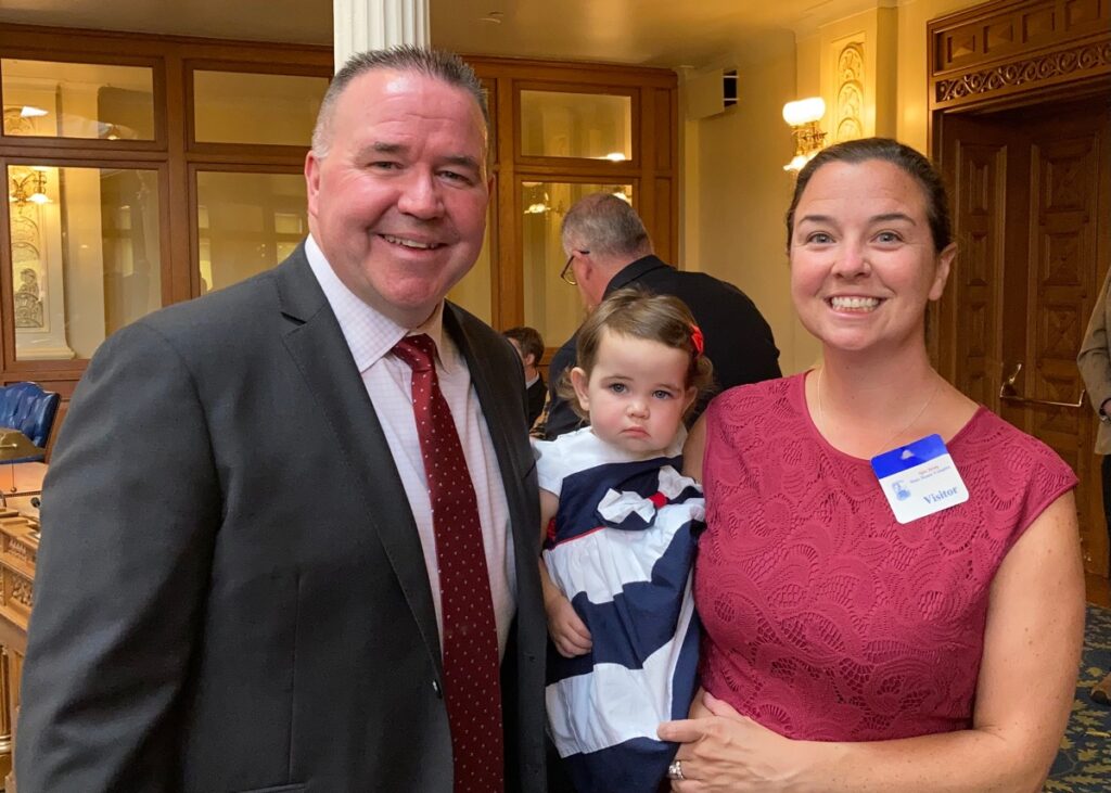 Assemblyman Alex Sauickie standing with his wife, Margaret, and his daughter, Emma.